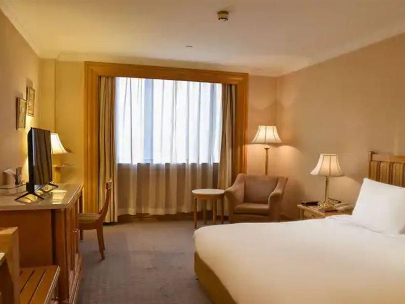 Crowne Plaza Shanghai Nanjing Road By Ihg Экстерьер фото A room at the hotel