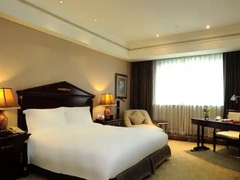 Crowne Plaza Shanghai Nanjing Road By Ihg Экстерьер фото A room at the hotel